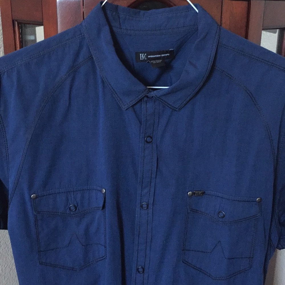 Short sleeve INC shirt.